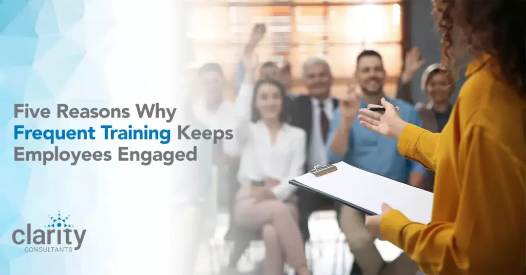 A presenter holds a clipboard while speaking to a group of employees, some raising their hands; text reads, "Five Reasons Why Frequent Training Keeps Employees Engaged.