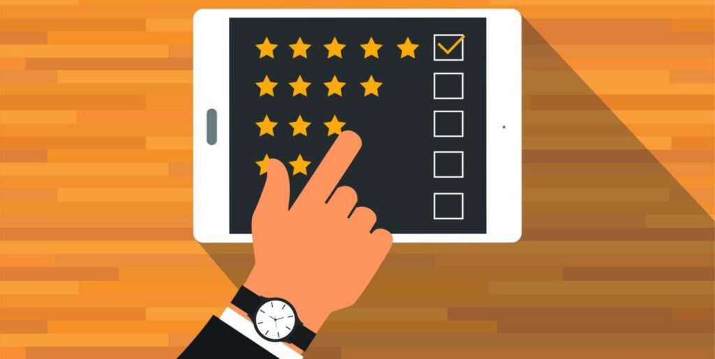 Illustration of a hand touching a tablet screen, selecting a five-star rating from multiple star rating options, with a wooden surface background.